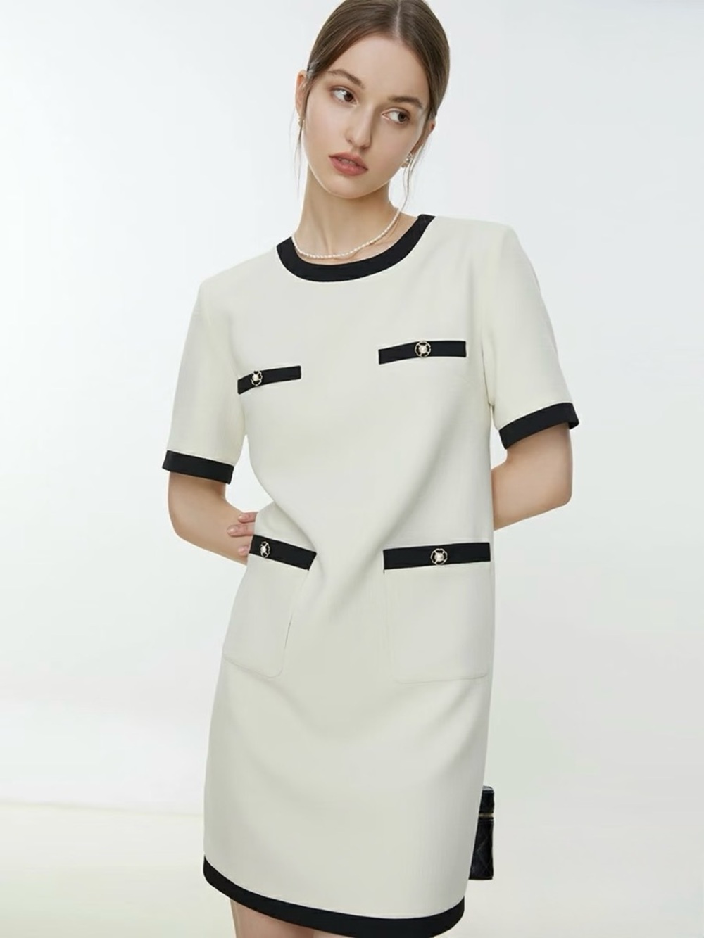 Elegant Cream Mini Dress with Black Trim